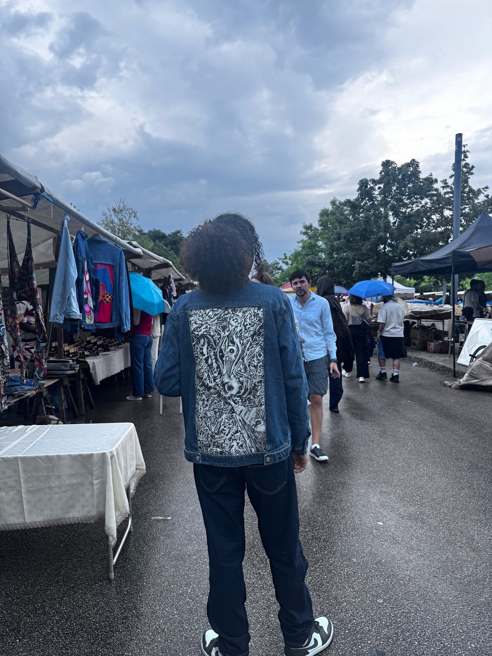 Customer wearing a YAGI jacket, back view with art panel