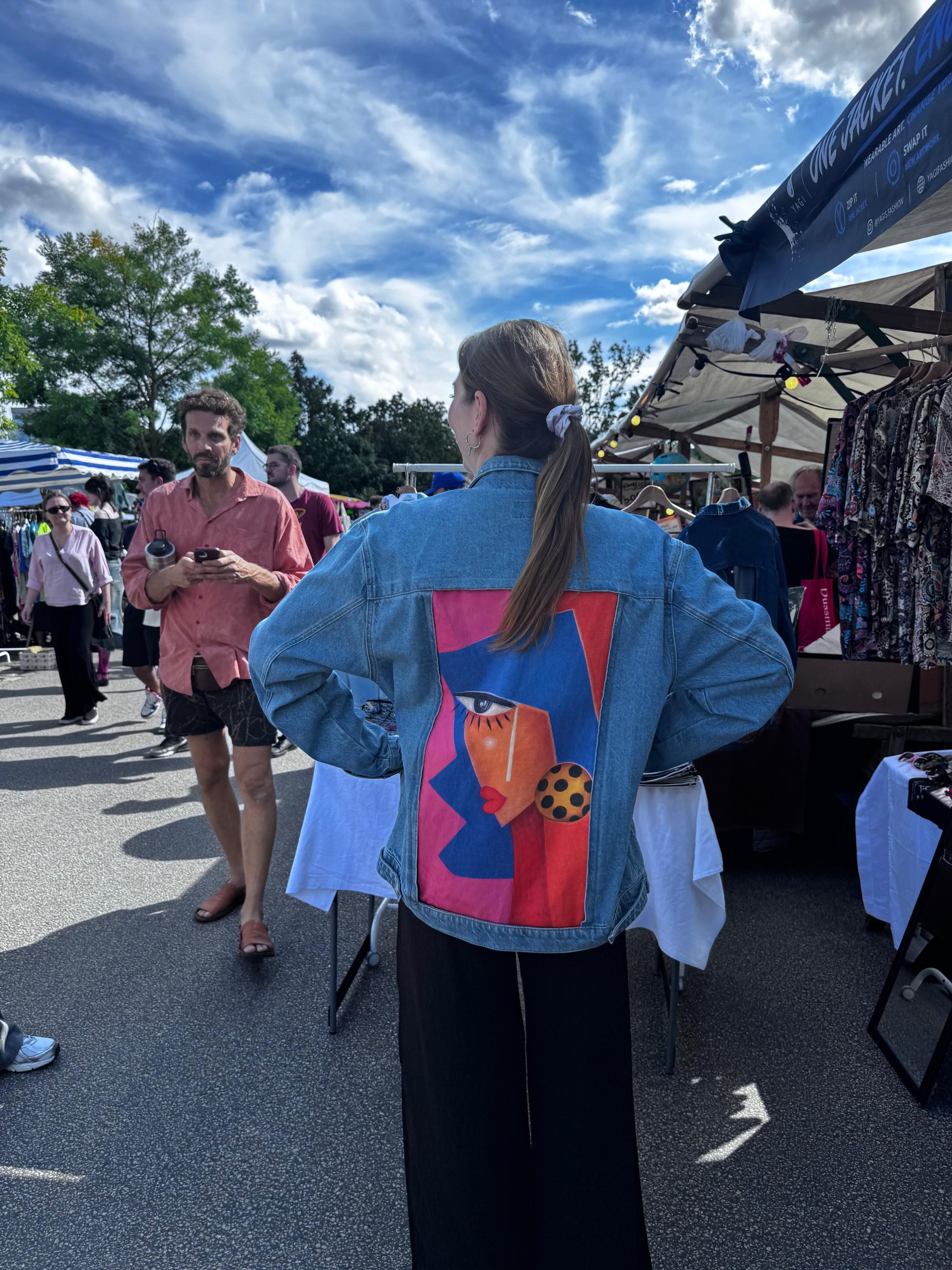 Customer wearing a YAGI jacket, back view with art panel
